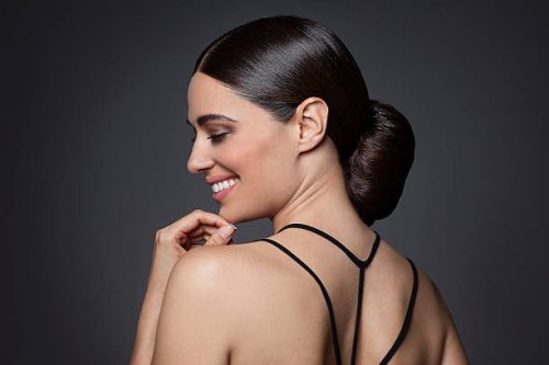 portrait of beautiful woman with brunette hair - hairstyle stock-fotos und bilder