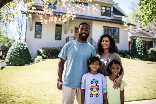 portrait of family in front of home - home decoration stock pictures, royalty-free photos & images