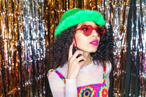portrait of fashion model with bizarre outfit isoalted on party background - fashion stock pictures, royalty-free photos & images