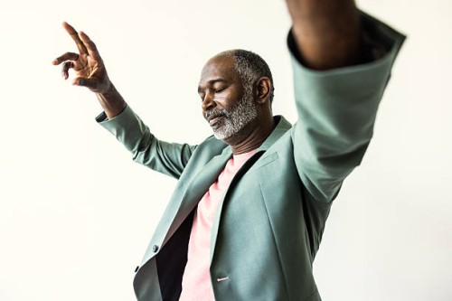 portrait of fashionable senior man with gray hair on white background - fashion stock pictures, royalty-free photos & images