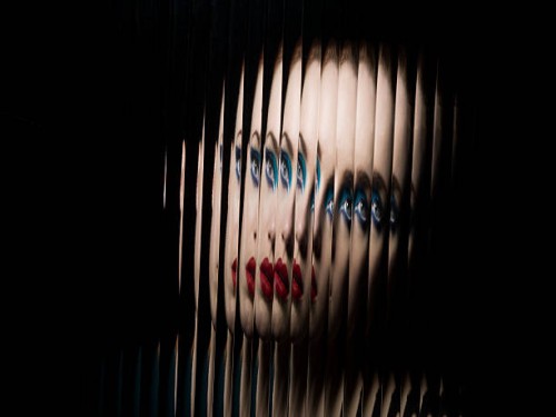 portrait of female through glass - fashion stock pictures, royalty-free photos & images