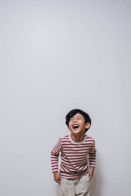 portrait of handsome boy posing in photo studio - fashion stock pictures, royalty-free photos & images