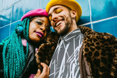 portrait of happy young man with mid adult woman - fashion stock pictures, royalty-free photos & images