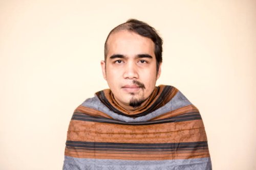 portrait of indonesian man with weird hair - hairstyle stock pictures, royalty-free photos & images