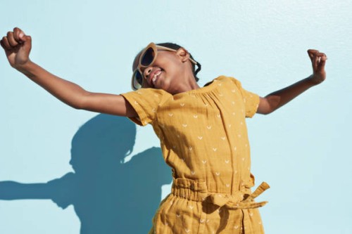 portrait of jumping cool girl with sunglasses - fashion stock pictures, royalty-free photos & images