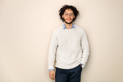 portrait of office worker with curly hair - fashion photos et images de collection