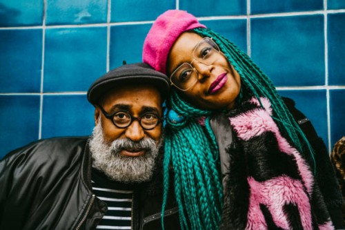 portrait of senior man and mid adult woman wearing berets - fashion photos et images de collection