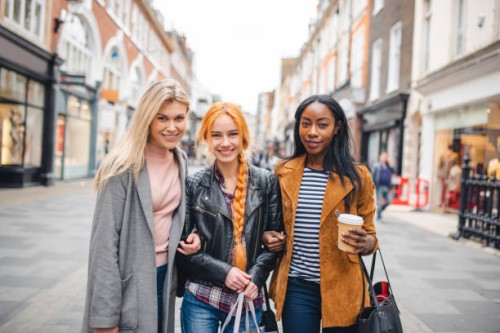 portrait of three young women shopping in the center of london - fashion stock pictures, royalty-free photos & images