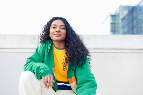 portrait of woman in city street - fashion stock pictures, royalty-free photos & images