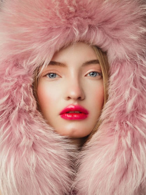 portrait of woman in fur hat - fashion stock pictures, royalty-free photos & images