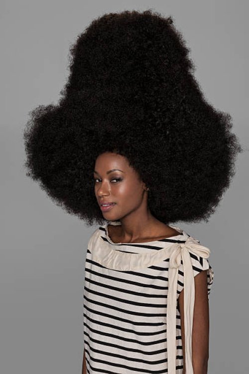 portrait of woman with very large afro - hairstyle stock pictures, royalty-free photos & images