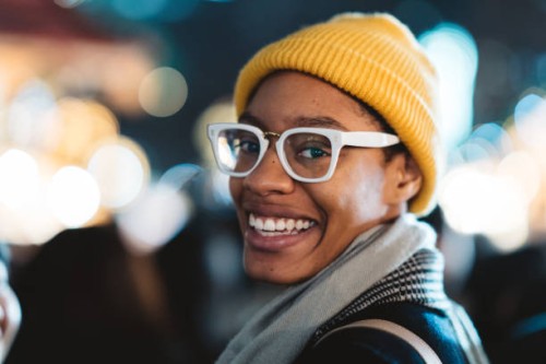 portrait of young african american woman while looking at camera - fashion stock pictures, royalty-free photos & images