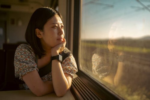 portrait of young female tourist traveling by train - travel stock pictures, royalty-free photos & images
