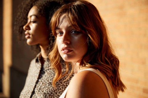 portrait of young woman in city - fashion stock pictures, royalty-free photos & images