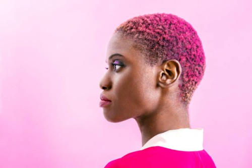 portrait of young woman with pink hair and clothing against pink background,buenos aires,argentina - fashion stock pictures, royalty-free photos & images