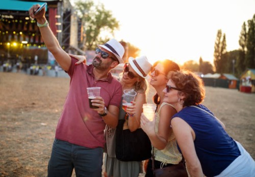 posing for selfie at music festival - concert stock pictures, royalty-free photos & images