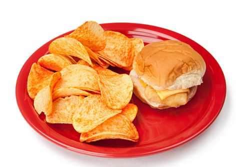 pototo chips and fish sandwich meal or unhealthy eating - junk food stock pictures, royalty-free photos & images