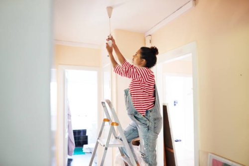 pregnant young woman renovating home - home decoration stock pictures, royalty-free photos & images