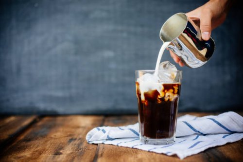 prepairing iced latte on wooden table - coffee stock pictures, royalty-free photos & images