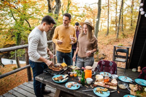 preparing food outdoors together - food stock pictures, royalty-free photos & images