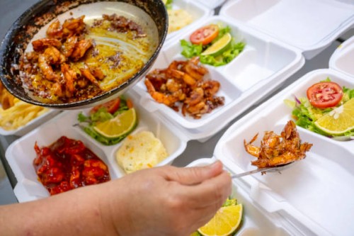 preparing take-away orders - junk food stock pictures, royalty-free photos & images