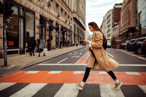 pretty woman crossing the street - fashion stock pictures, royalty-free photos & images