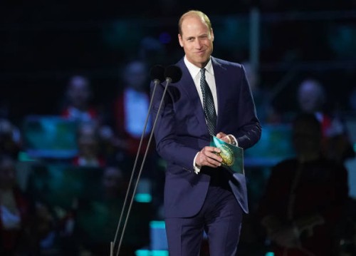 Prince William, Prince of Wales speaks on stage during the Coronation Concert in the grounds of Windsor Castle on May 7, 2023 in Windsor, England....