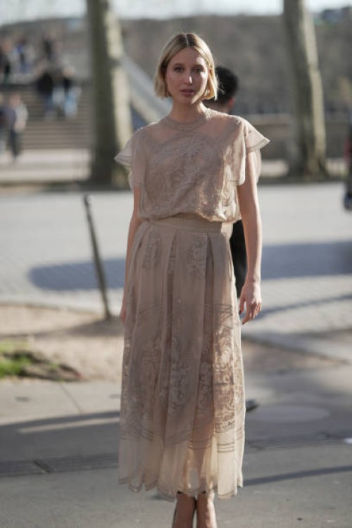 Princess Maria-Olympia of Greece and Denmark wears a brown maxi dress during the Womenswear Fall/Winter 2025/2026 as part of Paris Fashion Week on...