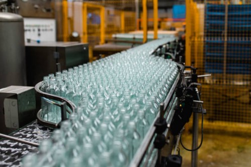 production line for juice bottling - food stock pictures, royalty-free photos & images