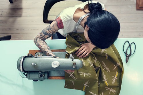 professional dressmaker at work - fashion stock pictures, royalty-free photos & images