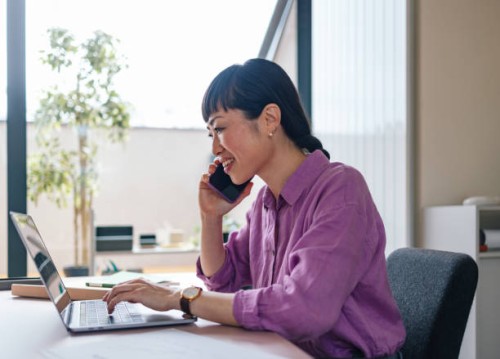 professional woman engaged in business call at modern office - home decoration stock pictures, royalty-free photos & images