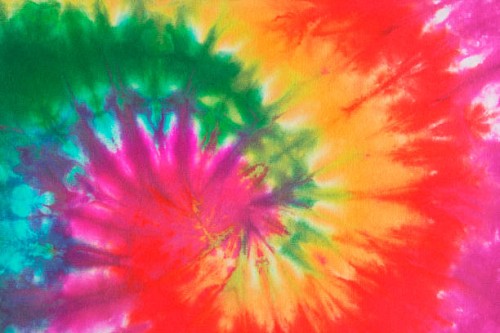 psychedelic tie dye, a 1960s style symbol of peace background - fashion stock pictures, royalty-free photos & images