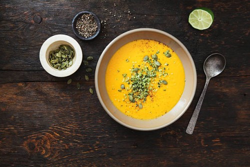 pumpkin soup with coconut and seeds - food stock pictures, royalty-free photos & images