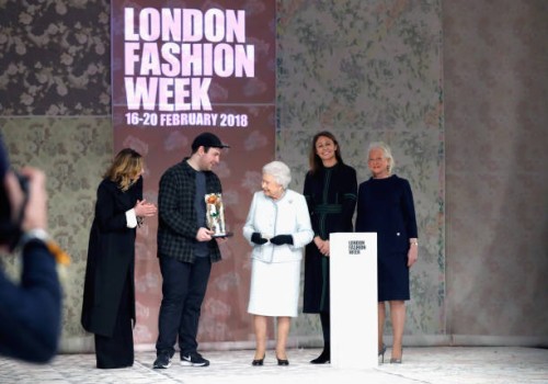 Queen Elizabeth II awards designer Richard Quinn the inaugural Queen Elizabeth II award for British Design alongside Chief Executive of the British...