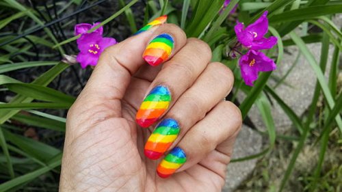 rainbow nail art with purple growing flower - nails art stock pictures, royalty-free photos & images