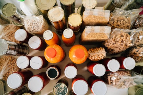 rearranging the kitchen pantry - food stock pictures, royalty-free photos & images