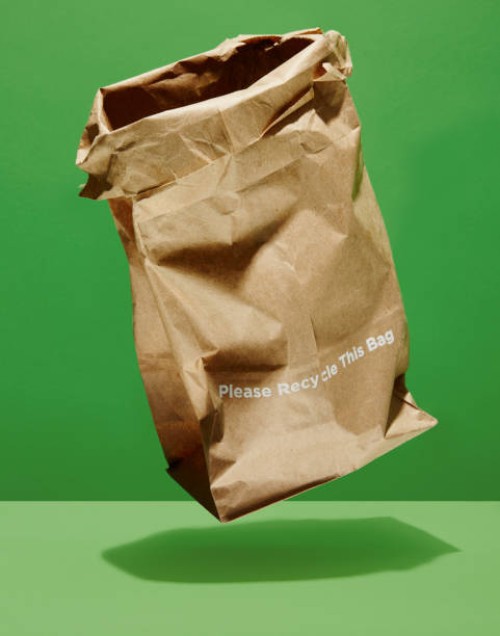 recycleable paper bag - junk food stock-fotos und bilder