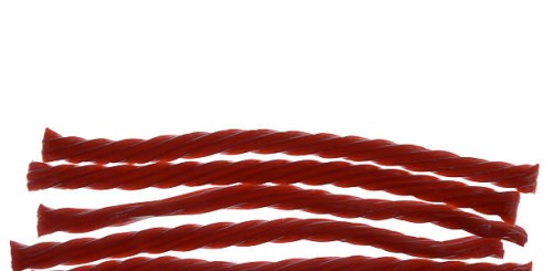 red licorice candy - junk food stockfoto's en -beelden