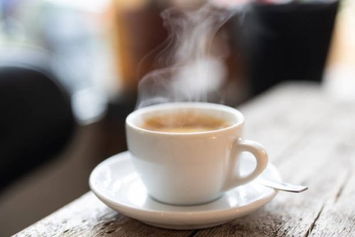 refreshing hot cup of coffee at a cafe - coffee stock pictures, royalty-free photos & images