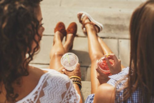 relaxing and tanning - junk food stock pictures, royalty-free photos & images