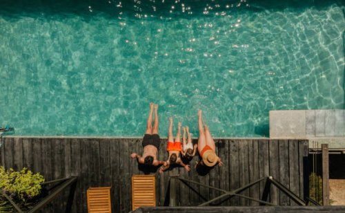 relaxing by the pool - travel stock pictures, royalty-free photos & images