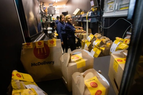 Restaurant workers packing orders for delivery during McDonald’s reopening on September 20, 2022 in Kyiv, Ukraine. McDonald’s reopens the first three...