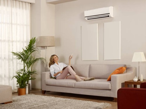 resting in a room with air conditioner - home decoration stock pictures, royalty-free photos & images