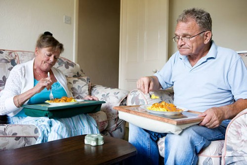 retirement: eating in - junk food stock pictures, royalty-free photos & images