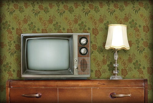 retro living room with a tv and a lamp atop a wooden desk - home decoration stock pictures, royalty-free photos & images