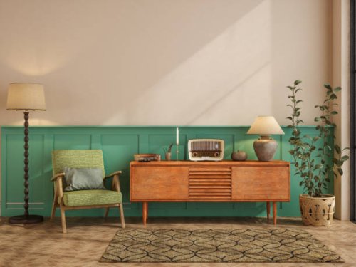 retro living room with green armchair, dresser, floor lamp and potted plant - home decoration stock pictures, royalty-free photos & images