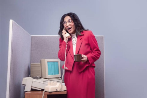 retro office worker on phone at computer cubicle - fashion stock pictures, royalty-free photos & images