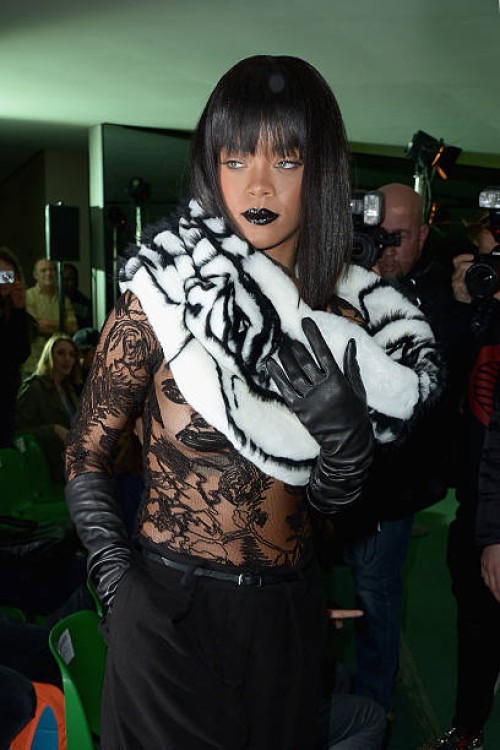 Rihanna attends the Jean Paul Gaultier show as part of the Paris Fashion Week Womenswear Fall/Winter 2014-2015 on March 1, 2014 in Paris, France.