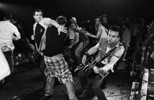 Riot on stage breaks out as the punk band "Fear" performs in a 1982 Reseda, California, concert staged at the Country Club.
