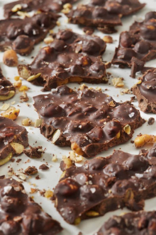 roasted chick pea and pumpkin seed chocolate bark - junk food stock pictures, royalty-free photos & images